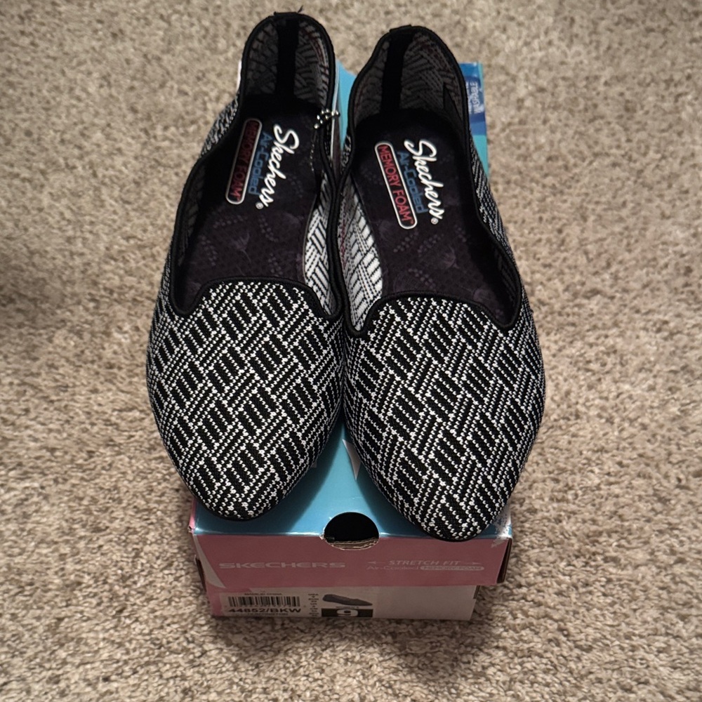 Skechers Black and White Cleo Slip-Ons